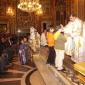 H7 Children who will receive Holy Communion this year offer a candle