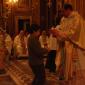 I7 Boy who will receive Holy Communion this year offers a candle