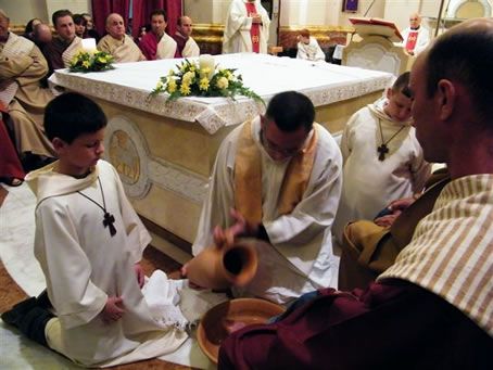 A8 Fr Anthony Teuma washing Apostle's feet