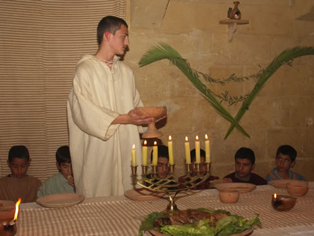 C6 Taking the chalice in his hands