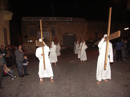 A3 Carrying crosses in votive offering