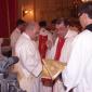 073 Archpriest of Xaghra puts the vests of deacon on Mark