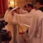 072 Archpriest of Xaghra puts the vests of deacon on Mark