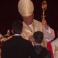 076 Young boy receives the Sacrament of Confirmation