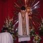 21 Fr Michael Curmi places the Holy Eucharist inside the tabernacle