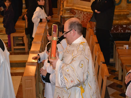 06 Deacon Mark Bonello carries the Bible Book