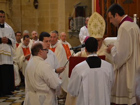 040 Mark kneels in front of Bishop