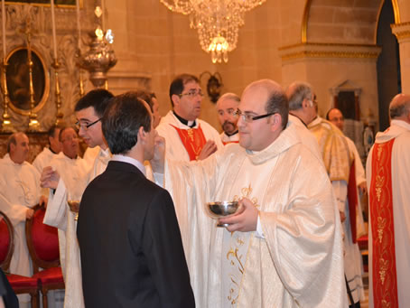 191 Fr Mark's uncle Raymond receives Holy Communion