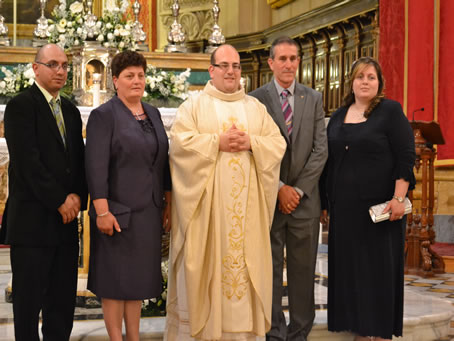 242 Fr Mark with parents and sister with her husband