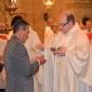 187 Fr Mark's father Saviour receives Holy Communion