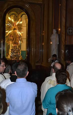 119 Praying in front of Our Lady of Victory