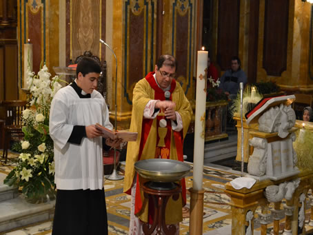 12 Blessing the baptismal water