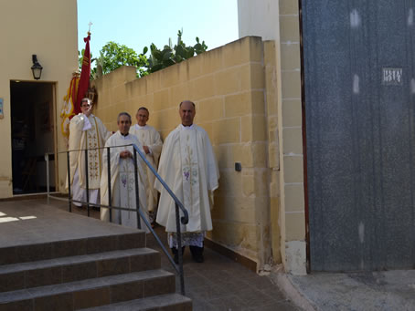 007 Celebrants coming out of Sacristy