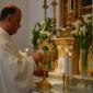 013 Rector Can John Sultana removes Host from monstrance