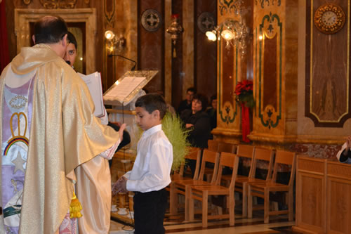 031 Denzil DeGabriele prepares for the investiture