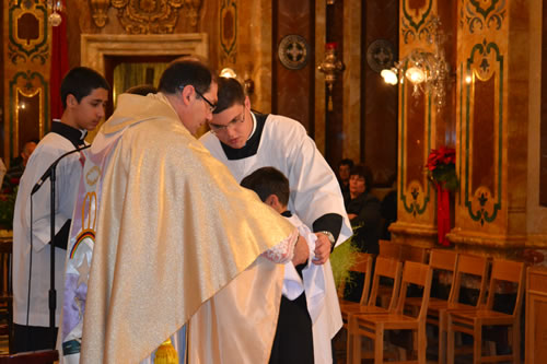 036 Denzil DeGabriele being invested as new altar boy