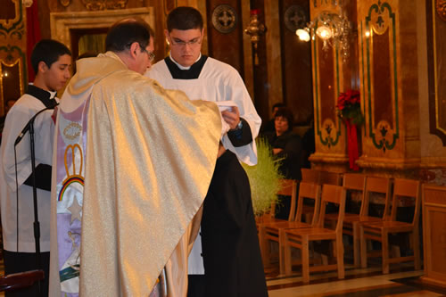 035 Denzil DeGabriele being invested as new altar boy