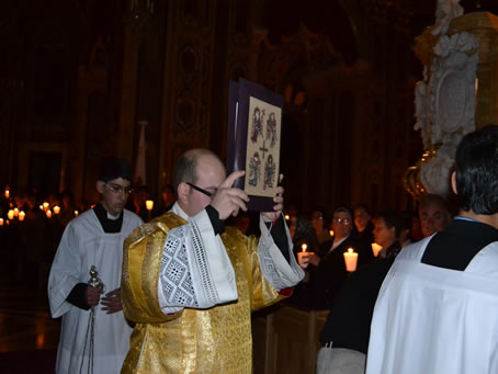 050 Deacon Bonello walks to the pulpit