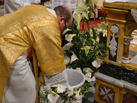 110 Deacon getting Holy Water to bless Congregation