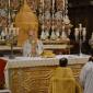 168 Deacon placing Holy Eucharist in monstrance