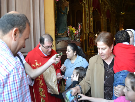 154 Youths Distributing Rosaries