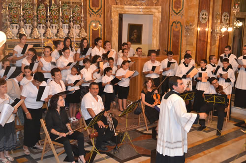 024 Fr Michael Curmi directing the choir