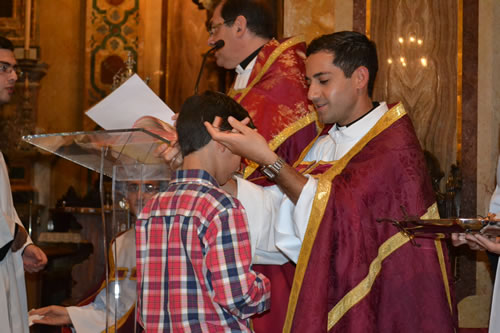 026 Candidate of Confirmation receives the Crucifix