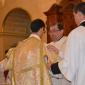 DSC_0093 Xaghra Archpriest helps Daniel put on the chasuble