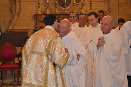 DSC_0113 Mgr Anthony Refalo embraces Deacon Daniel