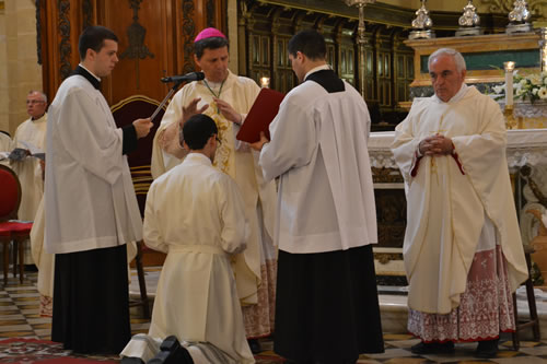 DSC_0086 Bishop prays on Daniel