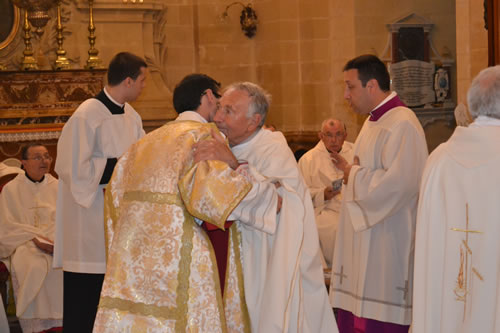 DSC_0108 Mgr Gregory Vella embraces Deacon Daniel