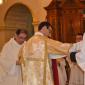 DSC_0097 Xaghra Archpriest helps Daniel put on the chasuble