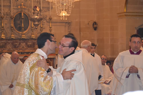 DSC_0128 Xaghra Vicar Fr Joseph Bajada embraces Deacon Daniel