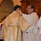 DSC_0096 Xaghra Archpriest helps Daniel put on the chasuble