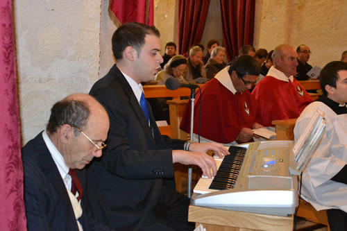 34 Mr Ivan Attard playing the organ