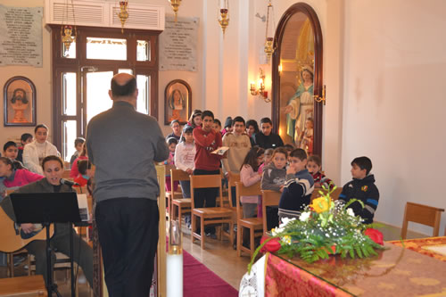 DSC_0098 Rector Can John Sultana addresses the children