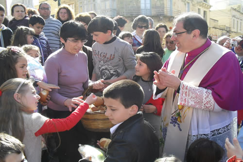 40 Distributing Easter Buns to children