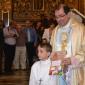 DSC_0208 Archpriest handing a boy a memento