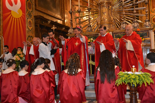 DSC_0056 Bishop praying over the candidates kneeling down