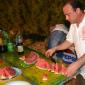 DSC_0247 Noel busy slicing water melons