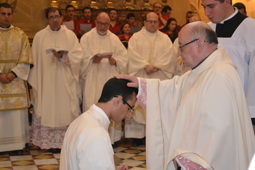 DSC_0070 Vicar General lays hands on Daniel's head