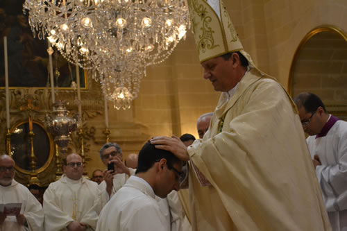 DSC_0067 Bishop lays his hands on Daniel's head