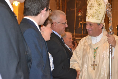 DSC_0289 Bishop congratulating Fr Daniel's father