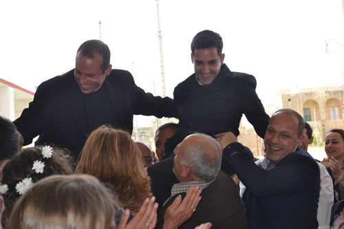 DSC_0443 Parish priest and vicar held on shoulders