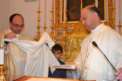 DSC_0028 Jonathan receives the habit of altar boy