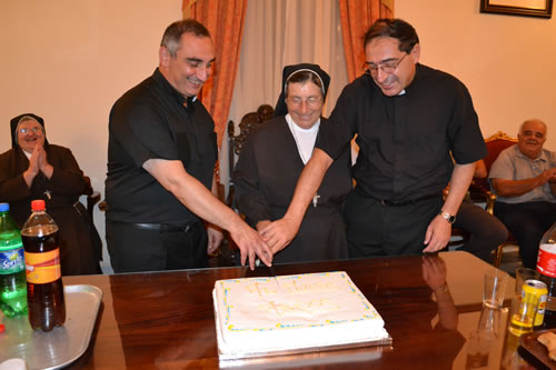 DSC_0390 The three celebrants cutting the Cake