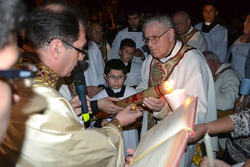 DSC_0017 Emedding grains of incense on the Paschal Candle