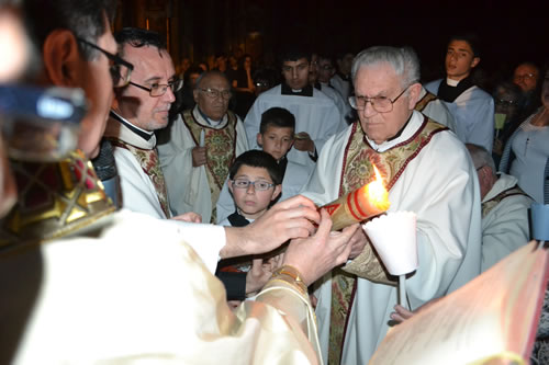 DSC_0019 Emedding grains of incense on the Paschal Candle