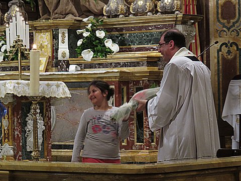 IMG_4947 Presenting a bouquet of flowers to Mgr Refalo