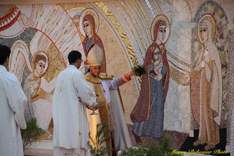 034 Bishop Grech sprinkling Holy Water on Mosaic